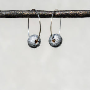 sterling silver hammered hoops with handmade silver paper bead