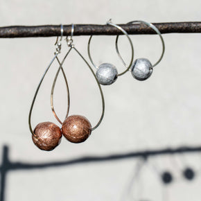 Sterling silver hammered hoops and paper beads collection