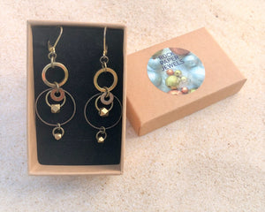 Brass concentric circles drop earrings in rock paper jewels gift box