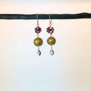 yellow gold plated wire wrapped earrings with ruby, garnet, iolite and handmade paper beads  shown on model