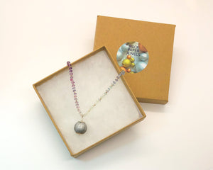Knotted Fluorite Necklace with Handmade Paper Bead Pendant
